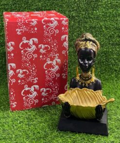 ADORNO DE NEGRITA CON HOJA EN MANO 1UND