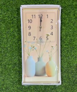 RELOJ DE PARED RECTÁNGULO CON DISEÑO FLORERO 20X40CM 1UND