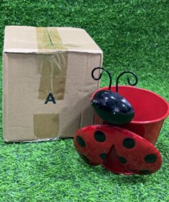 MACETA CON DECORACIÓN DE MARIQUITA ROJA 12.5*19.5CM 1UND