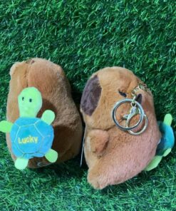 LLAVERO DE CAPYBARA QUE MUEVE TORTUGA 1UND