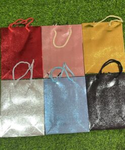 BOLSA DE REGALO DE COLOR LISO Y BRILLO 23*17.5*8 1UND