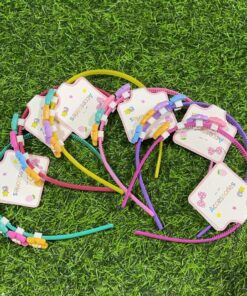 DIADEMA DE MINI LAZOS 1UND