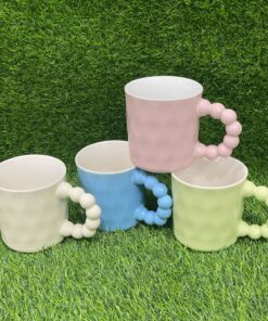 JARRA CERÁMICA DE COLOR LISO Y CON AGARRADOR DISEÑO DONA 1UND