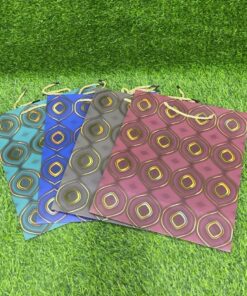 BOLSA DE REGALO CON DISEÑOS 32*26*12CM 1UND