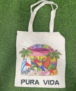 BOLSA TELA CON LETRA PURA VIDA DISEÑO CRUCEROS / PERICO / PEREZOSO 40*35CM 1UND / 90438-78