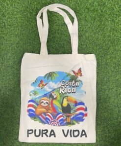 BOLSA TELA CON LETRA PURA VIDA DISEÑO TUCÁN / PEREZOSO / PERICO 40*35CM 1UND / 90438-80