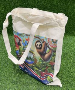 Alternative view of BOLSA TELA CON LETRA PURA VIDA DISEÑO ESCUDO DE C.R. / PEREZOSO / PERICO 40*35CM 1UND / 90438-82